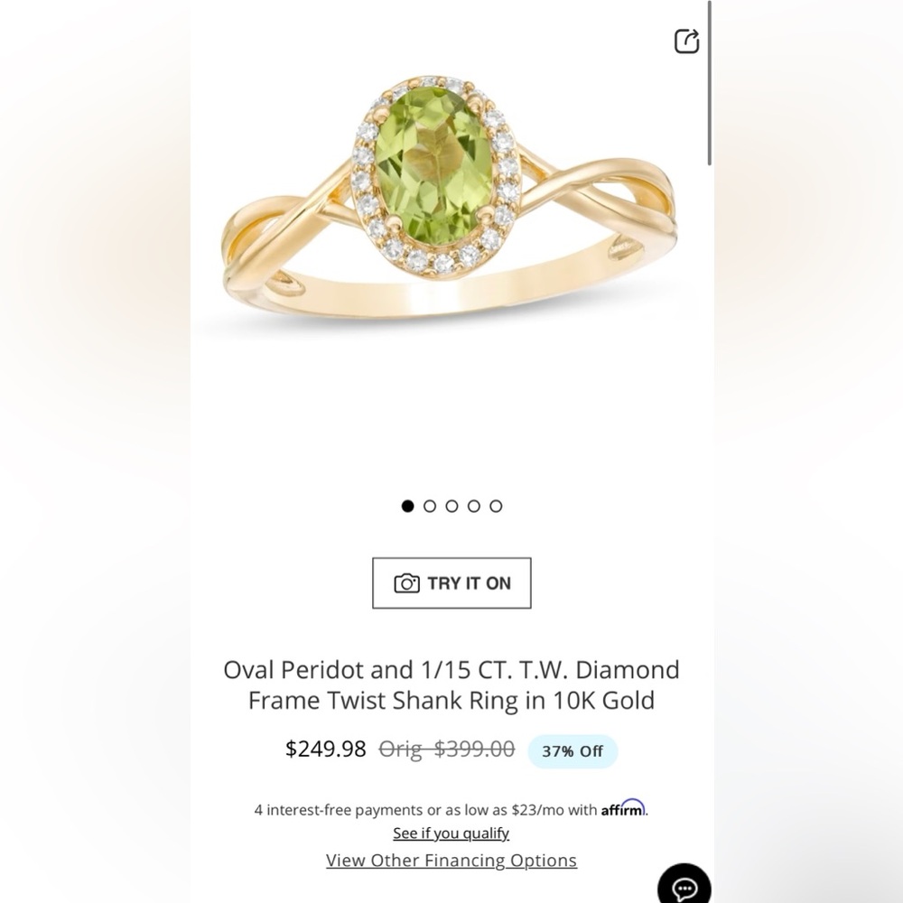 Zales Oval Peridot and 1/15 CT. T.W. Diamond
Frame Twist Shank Ring in 10K Gold